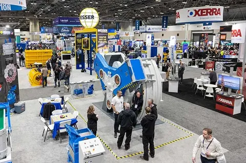 Visitors at equipment booths during The Precast Show 2026