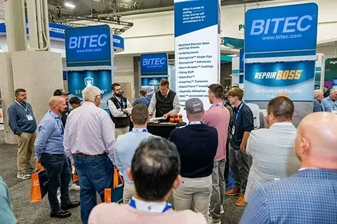 Visitors on the International Roofing Expo exhibition floor