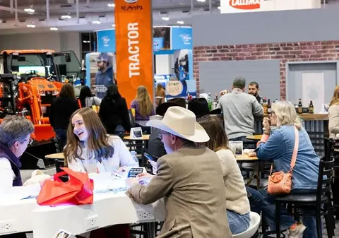 Visitors meeting exhibitors at CattleCon 2026