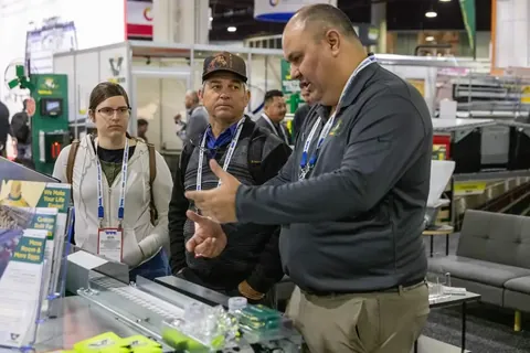 Exhibitor explaining production technology at IPPE 2026